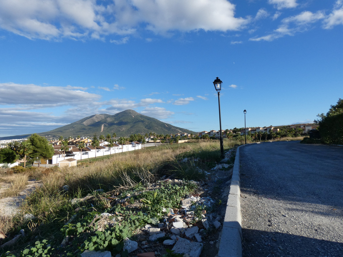 Grundstück in Coín