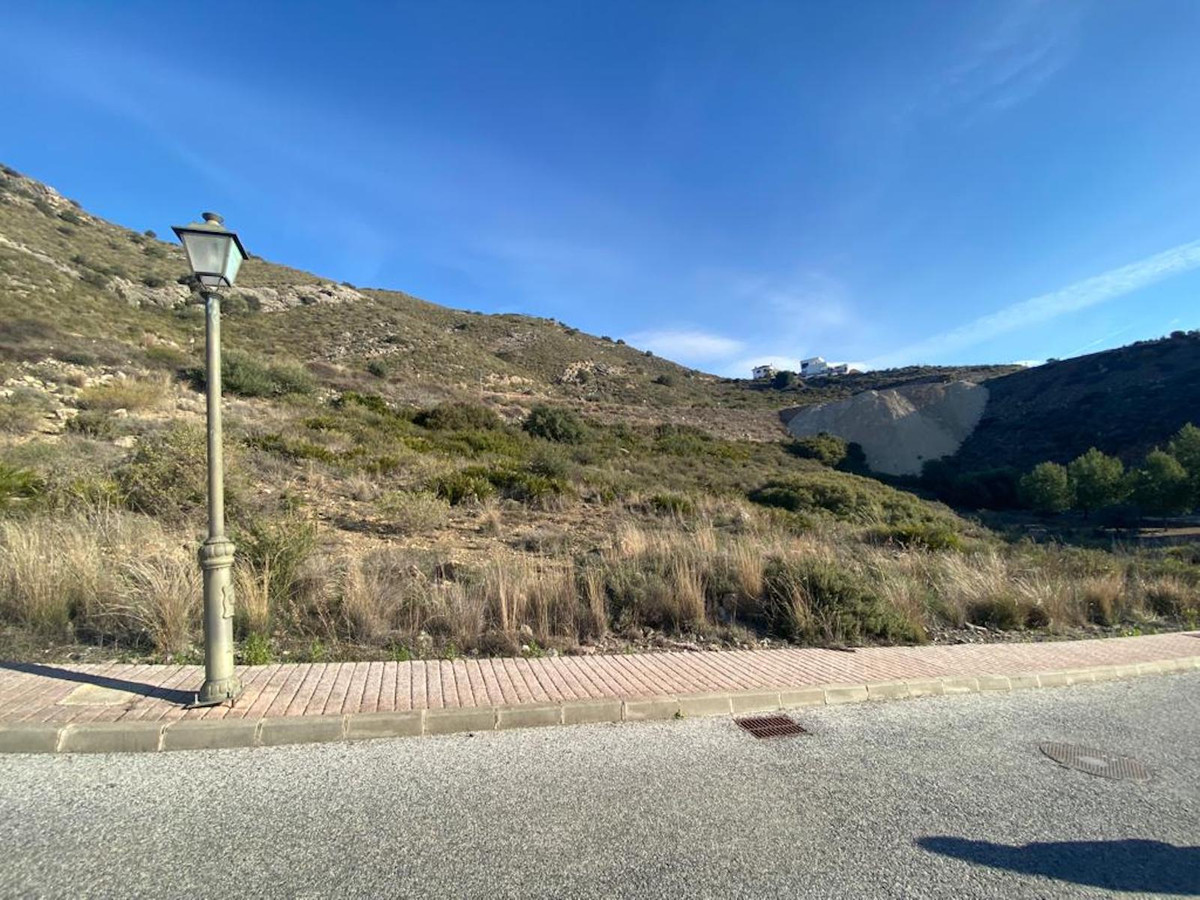 Grundstück in Coín